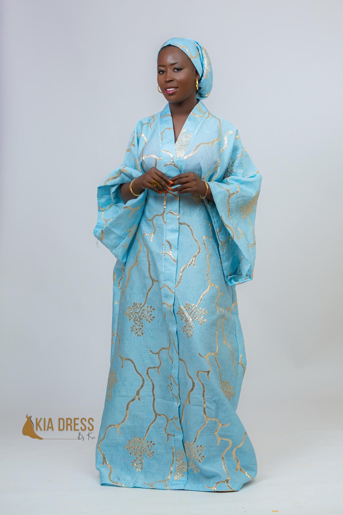 Boubou Reine Bayina en brocart bleu ciel – Kia Ladys